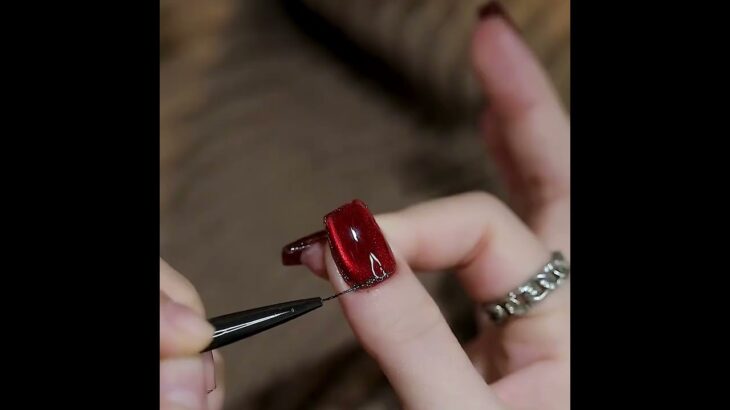 Crystal cat eye gel polish nail art design with red jelly gel polish