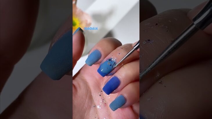 Blue hues unique French tip nails dipping 💙👀 combo with a star shaped glitter ombré design ✨💅