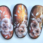 Autumn cat eye nail art with one stroke flowers. Beautiful fall cat eye nail design tutorial.