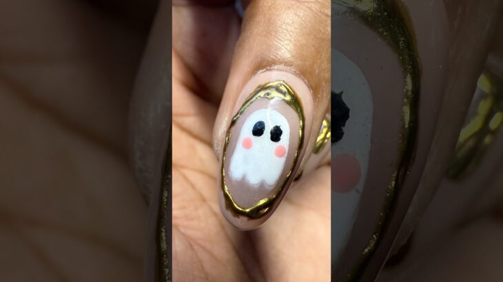 Ghost Halloween nails | gold isolated chrome nails
