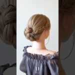 三つ編みに三つ編みを重ねるアップヘア