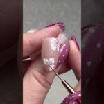 Soft shimmer + hand-painted florals #nailart #floralnails #springnails #handpaintednails